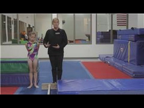 Gymnastics Tips and Exercises : How to Teach a Cast Handstand on the Bars in Gymnastics